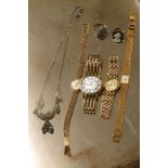 A gold watch and costume jewellery