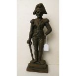 A cast iron door stop in the form of Napoleon