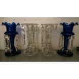 A pair of Victorian blue glass lustres with a pair of candlestick lustres