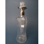 An Edwardian silver mounted glass decanter