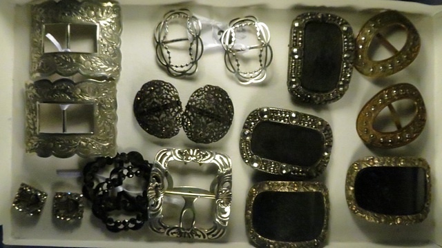 A collection of 18th and 19th century shoe buckles, including cut steel and silver