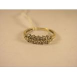 A 9ct yellow gold diamond ring set with brilliant cut stones