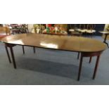 A Regency mahogany dining table having D ends on square legs and three extra leaves, 105" x 48"