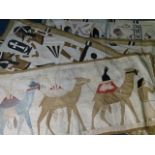 A collection of Egyptian wall hangings