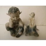 Two Royal Copenhagen porcelain figures of nymphs, one holding a snake, the other riding a turtle, 5"