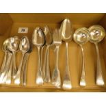 Mixed silver cutlery comprising mixed teaspoons, serving spoon, two ladles, starter forks and