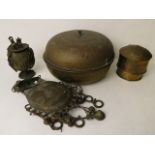 A group of four Ghanaian tribal arts brass items to include an Ashanti chiefs purse and a footed pot