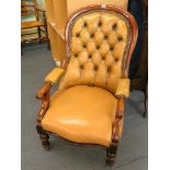 A Victorian mahogany leather upholstered open armchair