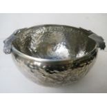 A Vrart continental white metal hammered bowl with cast handles in the form of birds