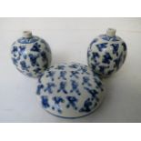 A pair of small Chinese porcelain ovoid vases with short narrow necks, decorated with the 100 boys