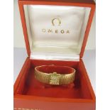 A 9ct gold boxed ladies Omega cocktail watch