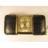 A 1950s leather and gilt cased Movado ladies purse watch