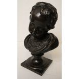 A bronzed bust of a young child, head and shoulders on a square base, circa 1900