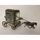 A 19th century French display case in the form of a horse and carriage