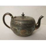 A Victorian silver teapot embellished with the zodiac, installed GF, possibly George Fox