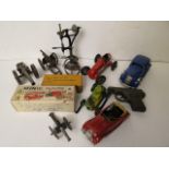 A collection of vintage tin plated toys to include a Schuco racing car and Minic boxed model