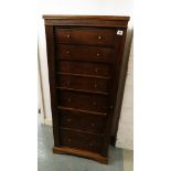 A 19th century French Empire style mahogany Wellington / secretaire on bracket feet