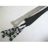 An Edwardian black jet bead and tassel opera length neck tie, together with a 1930s white paste