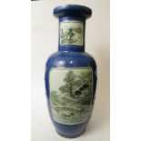 A 19th century Chinese porcelain vase of traditional shape, decorated with famille vert panels of