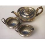 A Mappin & Webb princess plate, three piece silver plated teaset with gadrooned and fluted