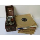 A cased Peter Pan gramophone with needle case, the case with label carrying patent number 195801,