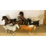 A mixed selection of Beswick pottery horse figurines to include a model of a Hackney hors (7)