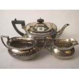 A late 19th century three piece tea set, London 1897, 32oz total