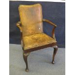 An 18th century mahogany framed show wood gents armchair having leather back and seat on cabriole