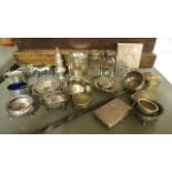 A collection of silver and white metal items to include cruets, trinkets and dressing table items