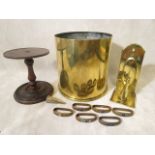 A large WW1 shell case, arts and crafts wall sconce, 19th century wig stand and arts and crafts