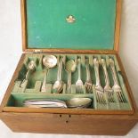 A canteen of matched Georgian silver cutlery in later case