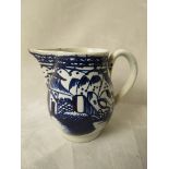 An 18th century Staffordshire Pearl ware cream jug with sparrow beak pourer and blue and white