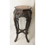A Chinese rosewood marble top vase stand on carved cabriole legs