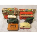A collection of vintage boxed Minic toys to include a caravan