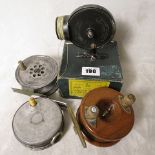 A selection of fishing reels to include a Hardy reel, a boxed Alcock Stanley Bakelite reel, a