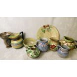 A selection of Mabel Leigh designed pottery for Shorter Bros, comprising six jugs, one vase, one