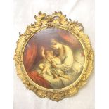 Circa 1890 a continental ornate gilt oval frame holding an oil on canvas, mother and children, 21