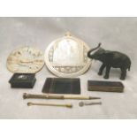 A 19th century painted ivory plaque, mother of pearl carved shell, bronze figure of an elephant,