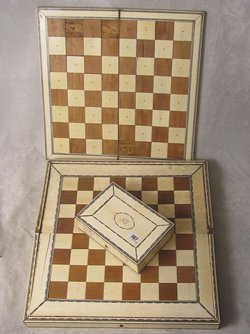 An early 19th century Danish ivory and fruit wood chess board, games box and Back Gammon board