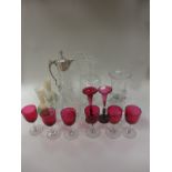 Six cranberry glass Wines, pair of Vases with metal bases, one A/F, a pair of club shape Vases