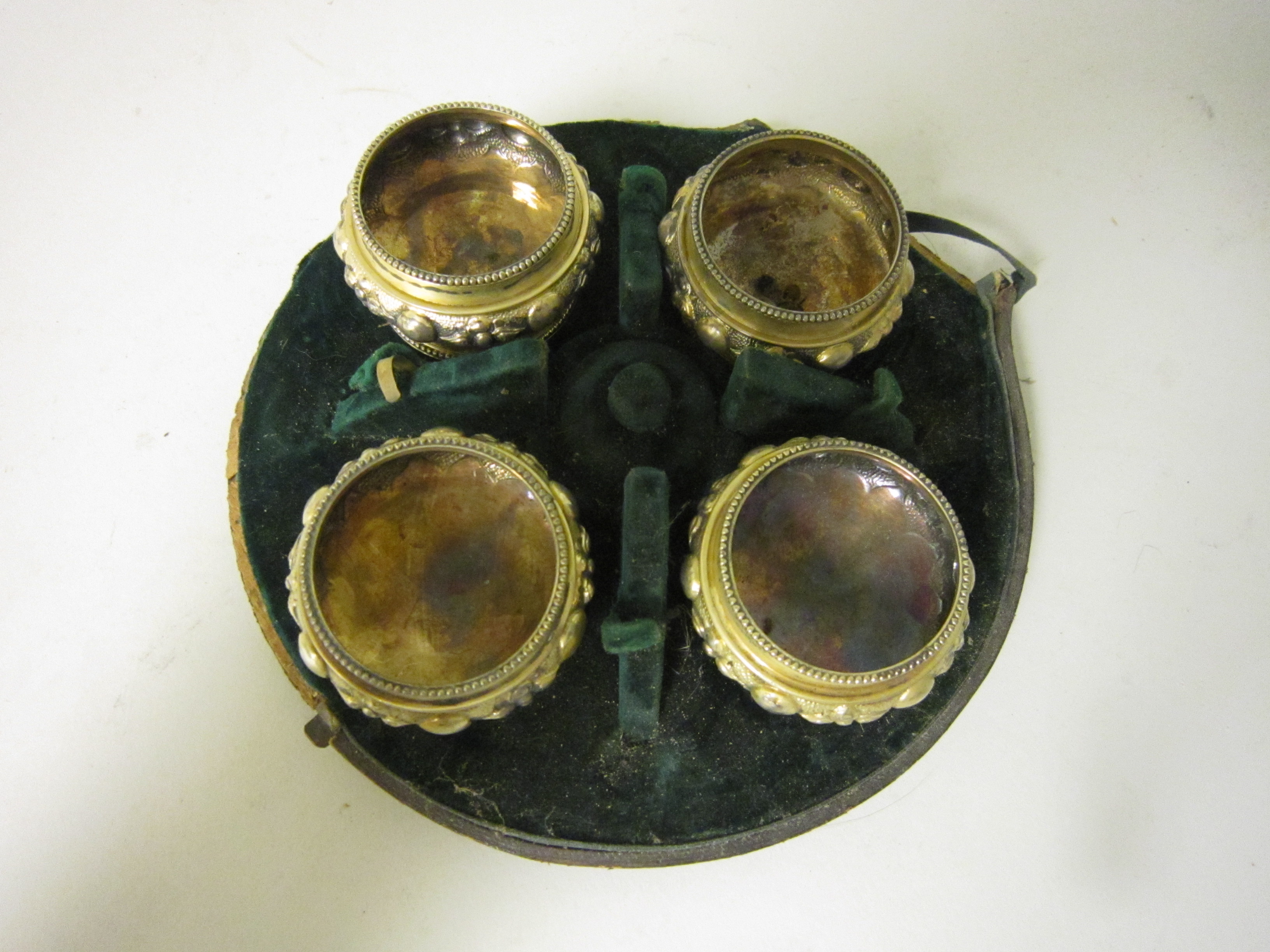 A set of four Victorian silver-gilt circular Salts with embossed friezes and beaded rims, London - Image 2 of 2