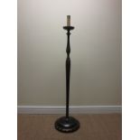 A black lacquered and gilt decorated Standard Lamp on circular base