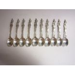 Ten Edward VII/George V silver Military Teaspoons with figural finials, Sheffield 1906 etc