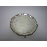 A Victorian silver shaped circular Salver with gadroon rim on three hoof feet, Sheffield 1895, 9 1/