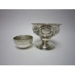 A Victorian silver pedestal Sugar Bowl with floral embossing and oval cartouches, London 1875 and