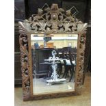 A Victorian oak large Wall Mirror with leafage scroll carved surround, 3ft 8in x 3ft