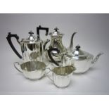 An Edward VIII/George VI four piece silver shaped oval Tea Service, Birmingham 1936/7 and a plated