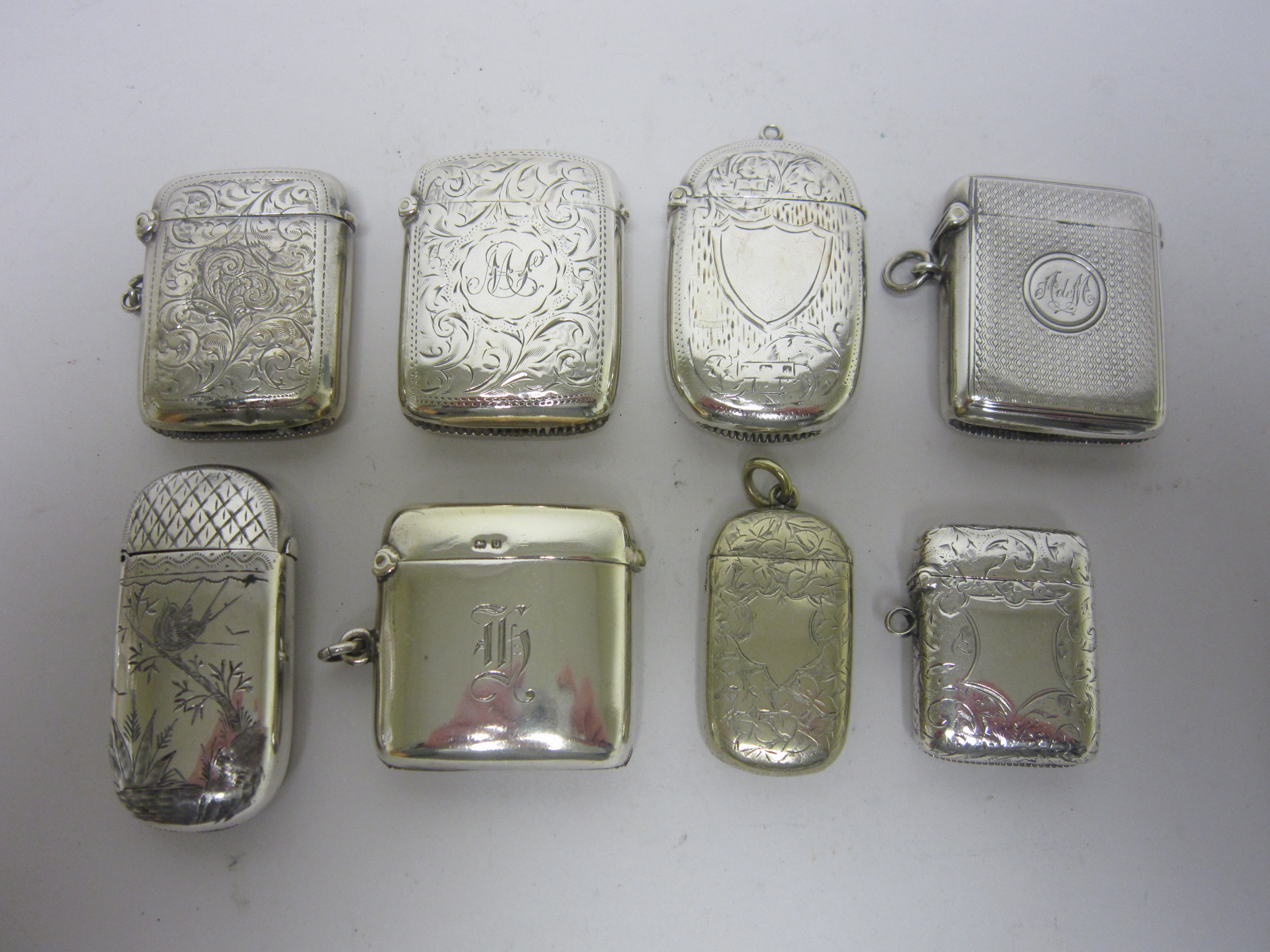 Six silver and two plated Vesta Cases