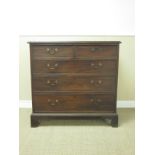 A 19th Century Mahogany Chest of two short and three long graduated drawers on bracket supports, 3ft