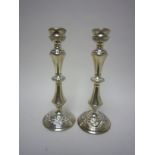 Pair of modern silver Candlesticks with foliate bands on circular bases, Birmingham 1976